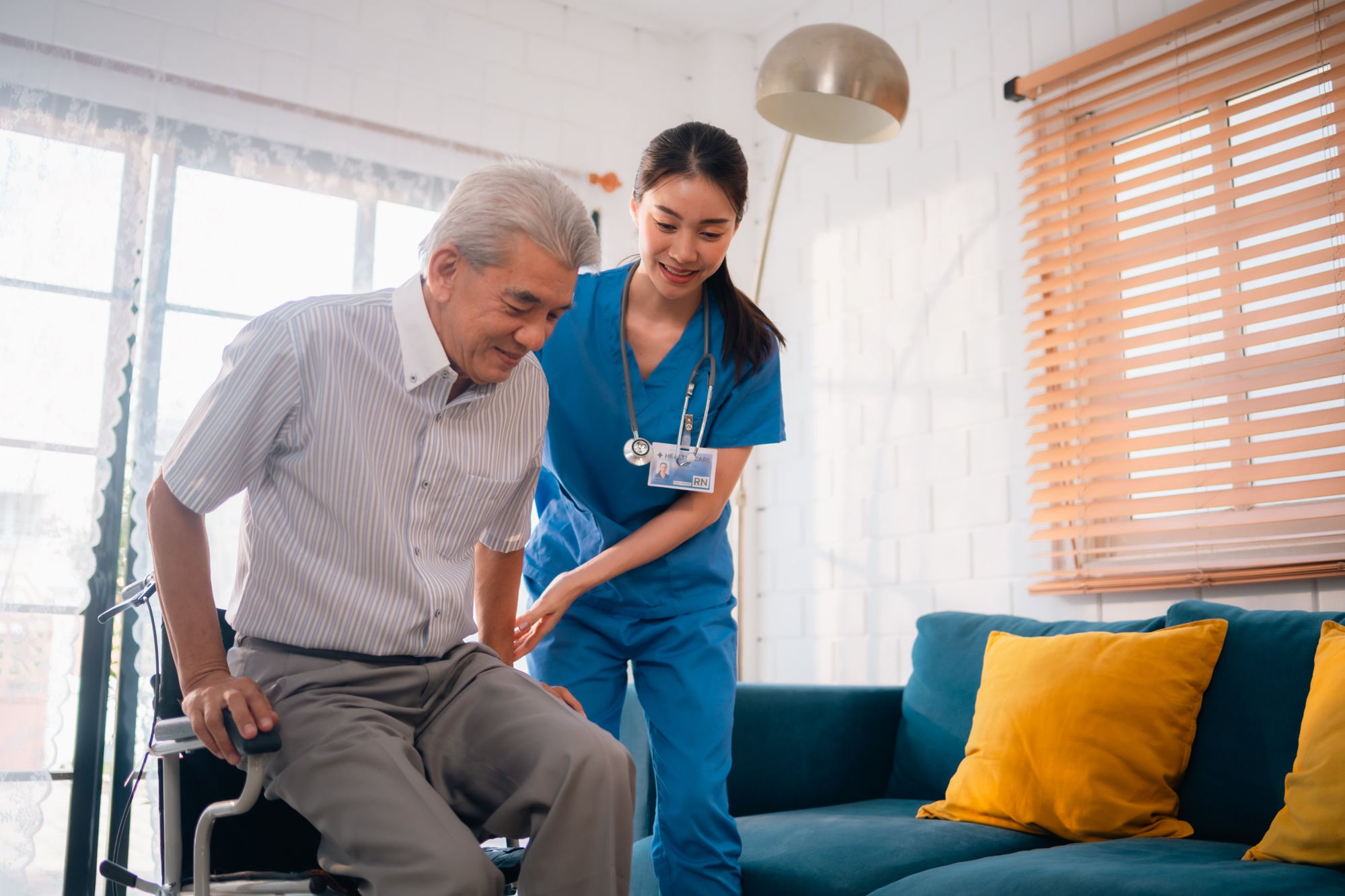 Caregiver supporting an elderly resident in long-term care &mdash; eCareLTC platform